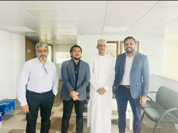 Shajeer with customer Al Kiyumi