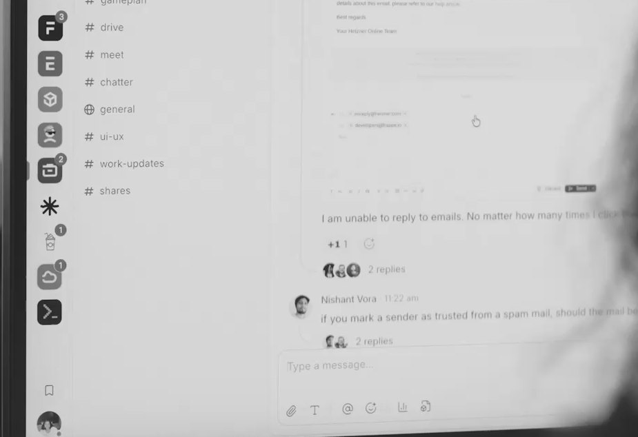 Raven open on a monitor: channels in the sidebar and a thread about email replies